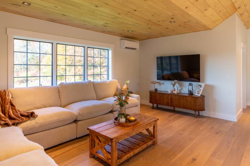 The living room, in one of the shed dormers • Interior finished by others • custom ADU