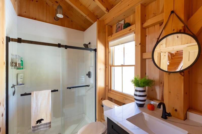 The timber frame barn has a full bathroom on the first floor