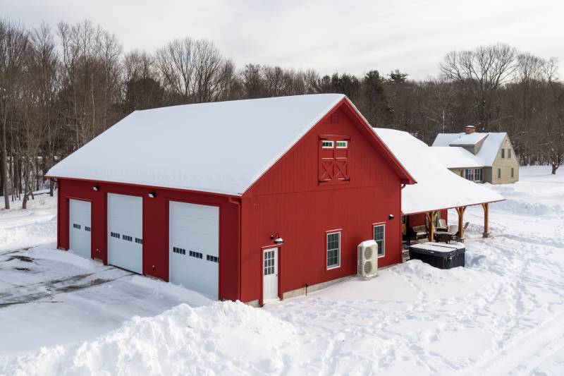 34' x 52' Attached Garage • 13' Wall Height • Three Overhead Doors