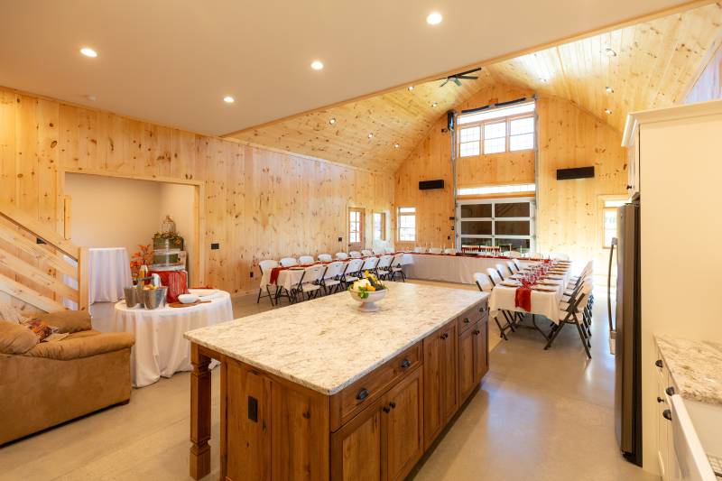 View from the kitchen looking towards the event space • Family event barn