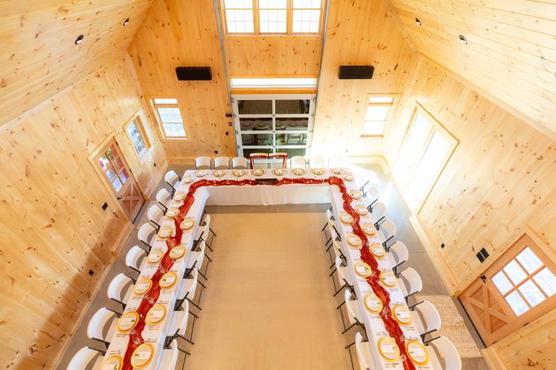 Looking down at the barn’s first floor from the loft