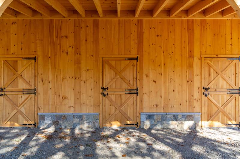 Pine Dutch Barn Doors underneath the open lean-to