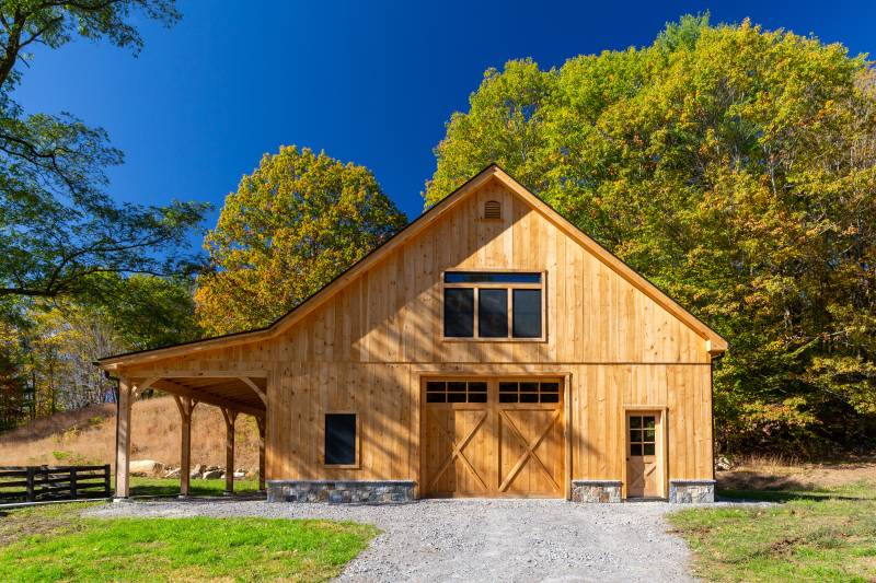 12' x 10' pine faced overhead door • 9-12 Roof Pitch