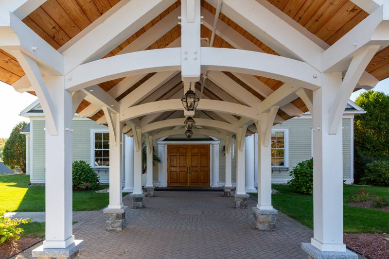 King post trusses with arched bottom chords • Timber frame pavilion