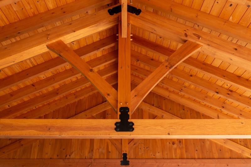 A closeup of the king post timber truss