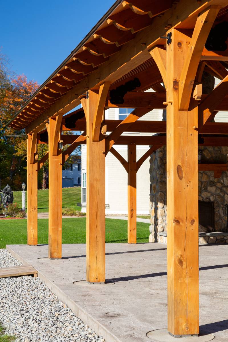 Scrolled rafter ends for added detail • Post & beam pavilion