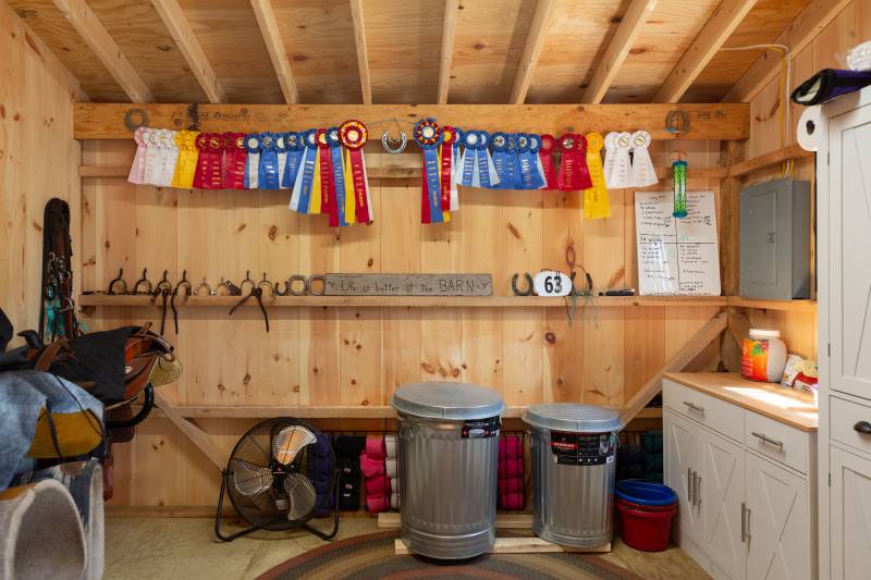 The tack room within the center aisle horse barn