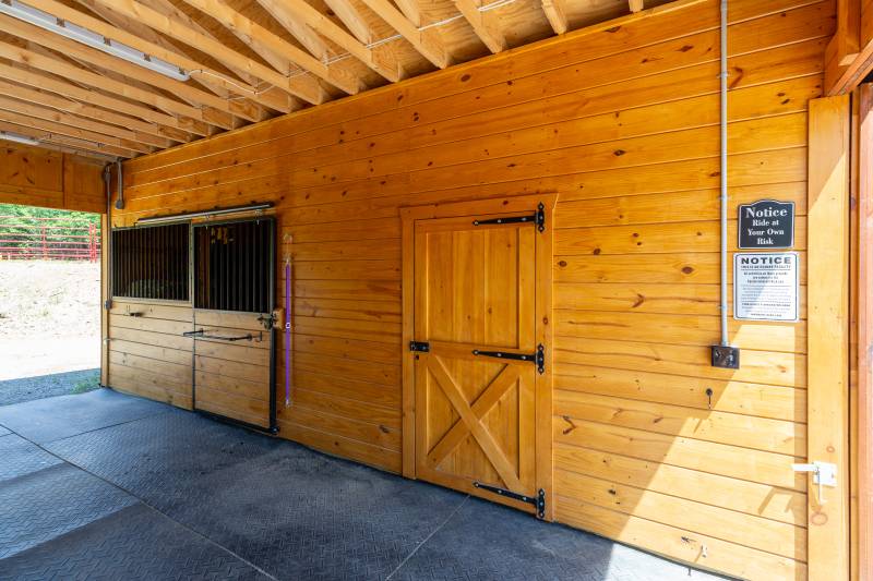 Entrance to the tack room • Hay storage in the back