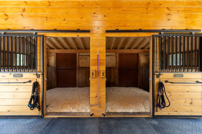 Each stall closes with a 4' sliding door with powder coated grills