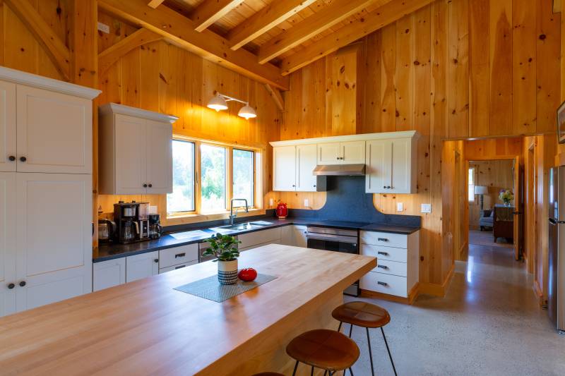 A full kitchen within the post & beam barn
