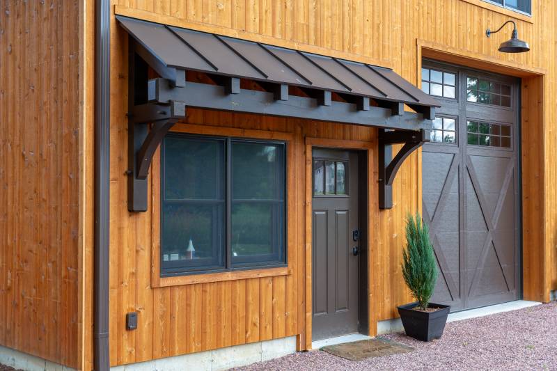 4' Timber Frame Eyebrow Roof • Dark Brown Entry & Overhead Doors