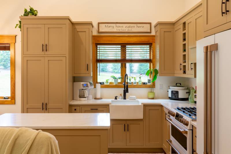 A large Andersen window in the kitchen lets natural light flow through the ADU’s interior
