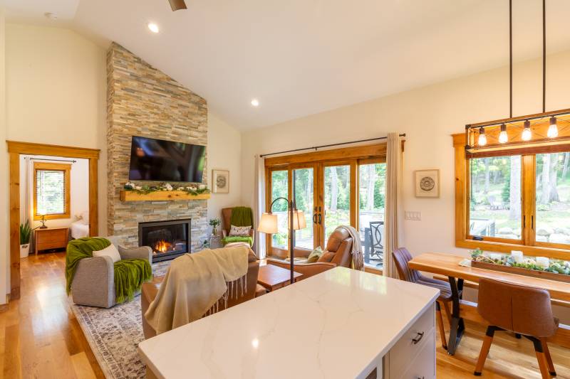 Gas fireplace with stone facade • Luxury ADU interior