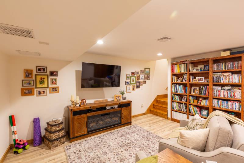 This Asheville ADU has a full basement, used as a media room