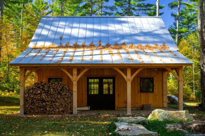 10' x 28' Open Lean-to Roof Overhang • The customer keeps firewood stored here for the cold months