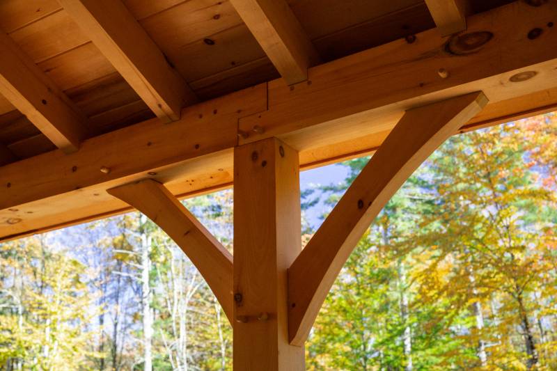 Authentic post & beam construction in the timber frame lean-to overhang