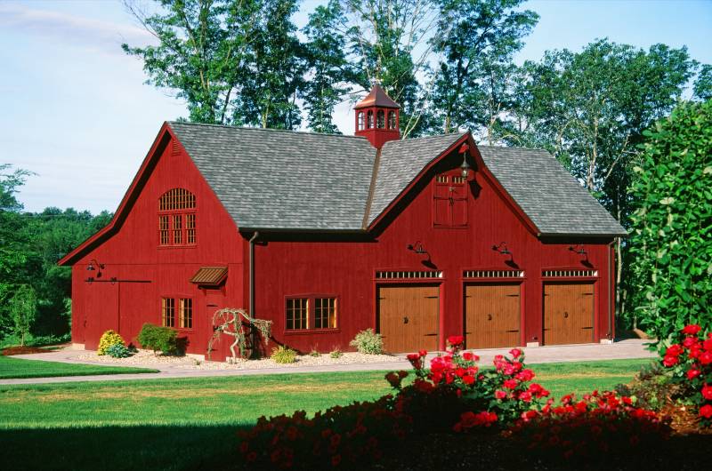 Pine siding stained a stunning red