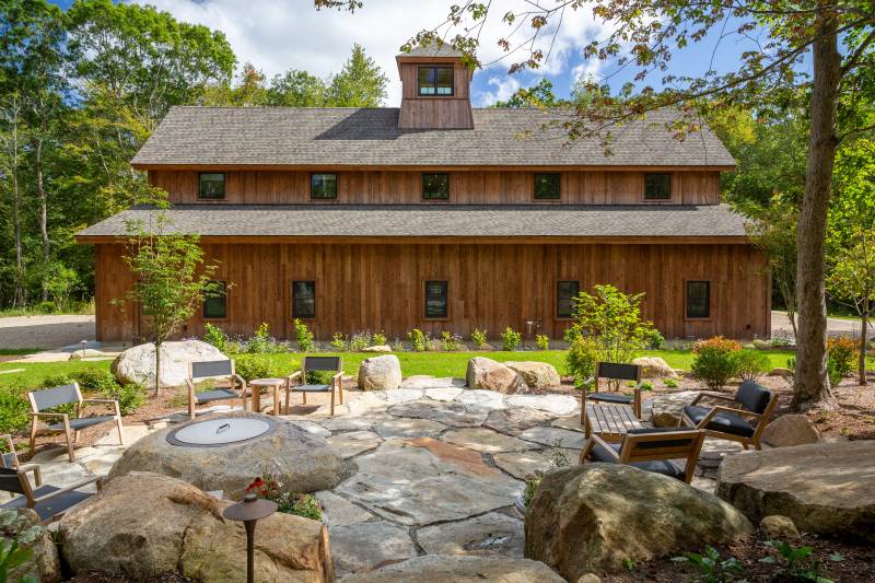 The post & beam barn as seen from the outdoor patio