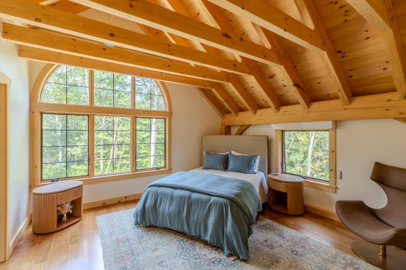 A bedroom within the Monitor Barn • Andersen 400 Series windows