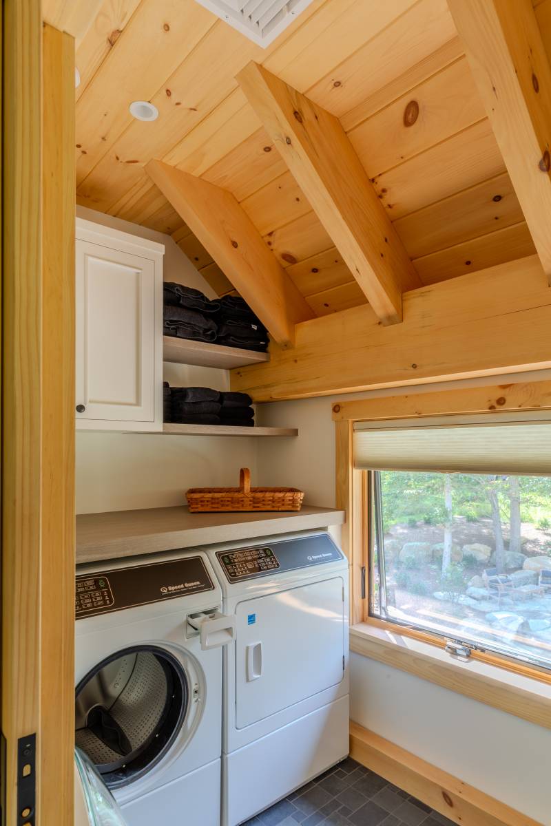 A washer & dryer can be found in the barn’s half bathroom