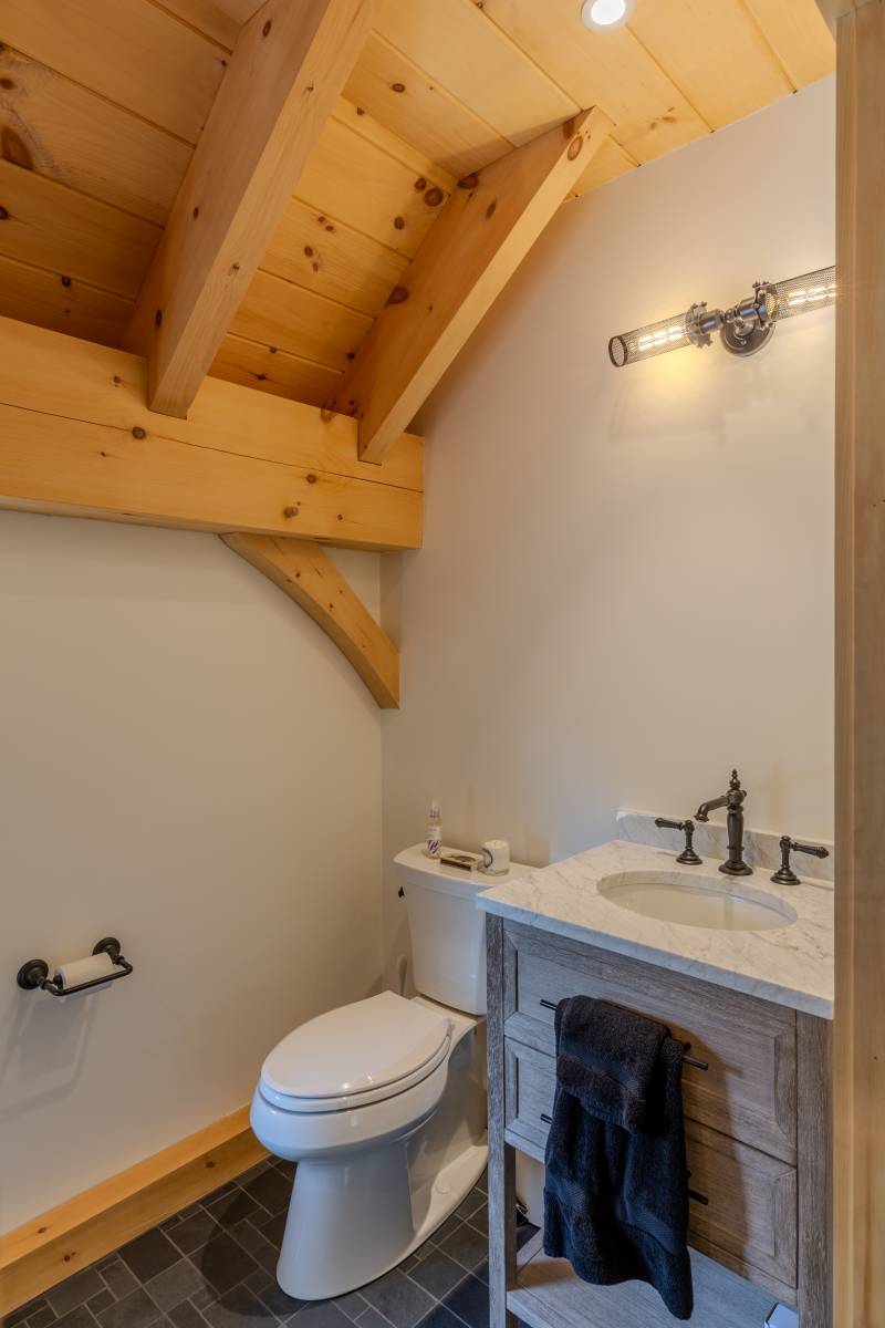 Another half bathroom within the post & beam barn