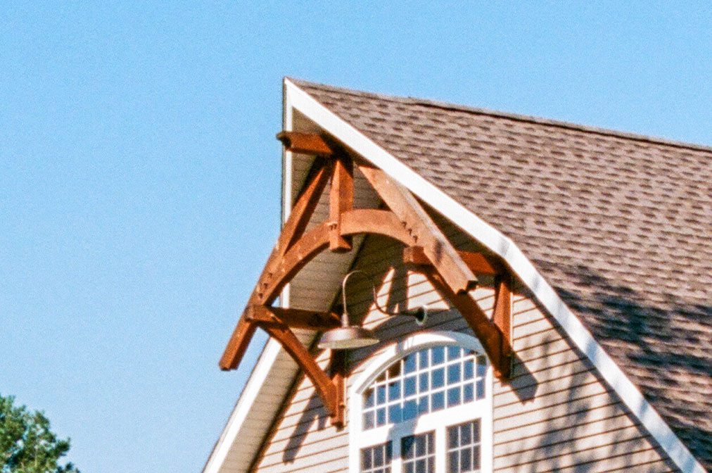 Cow Catcher Gable Peak with Timber Truss Accent