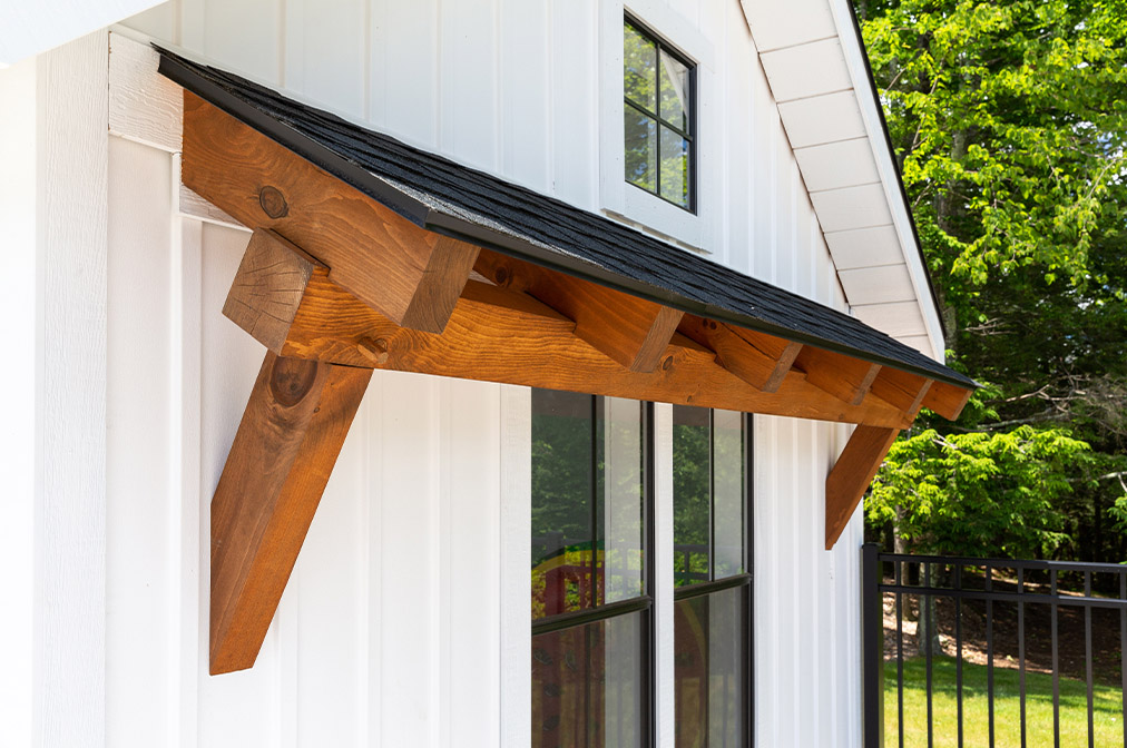 Modern Timber Frame Eyebrow Roof