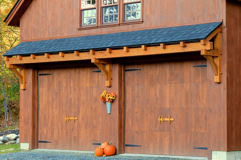 Timber Frame Eyebrow Roof Above Overhead Door