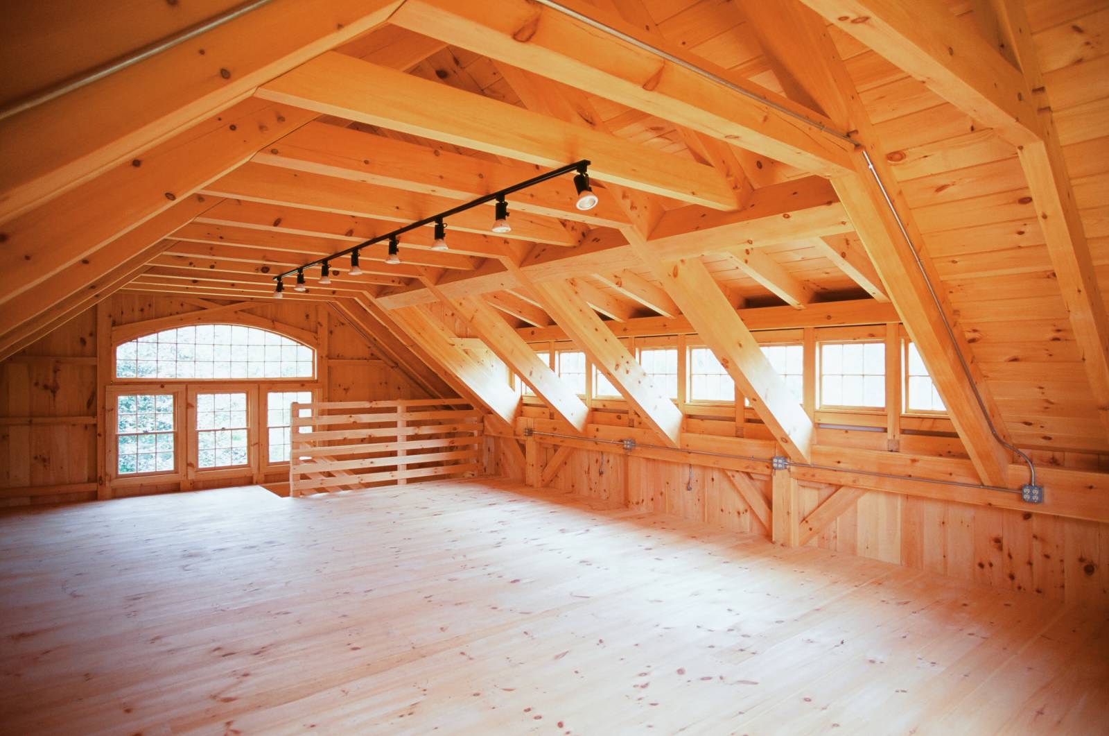 Expansive 2nd floor • heavy timber rafters • authentic joinery • bow top window