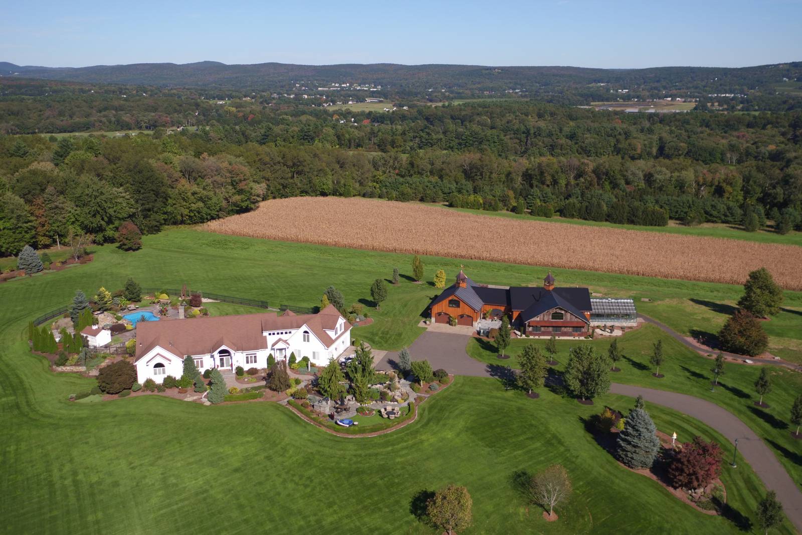 Main Home on the Left • Party Barn on the Right