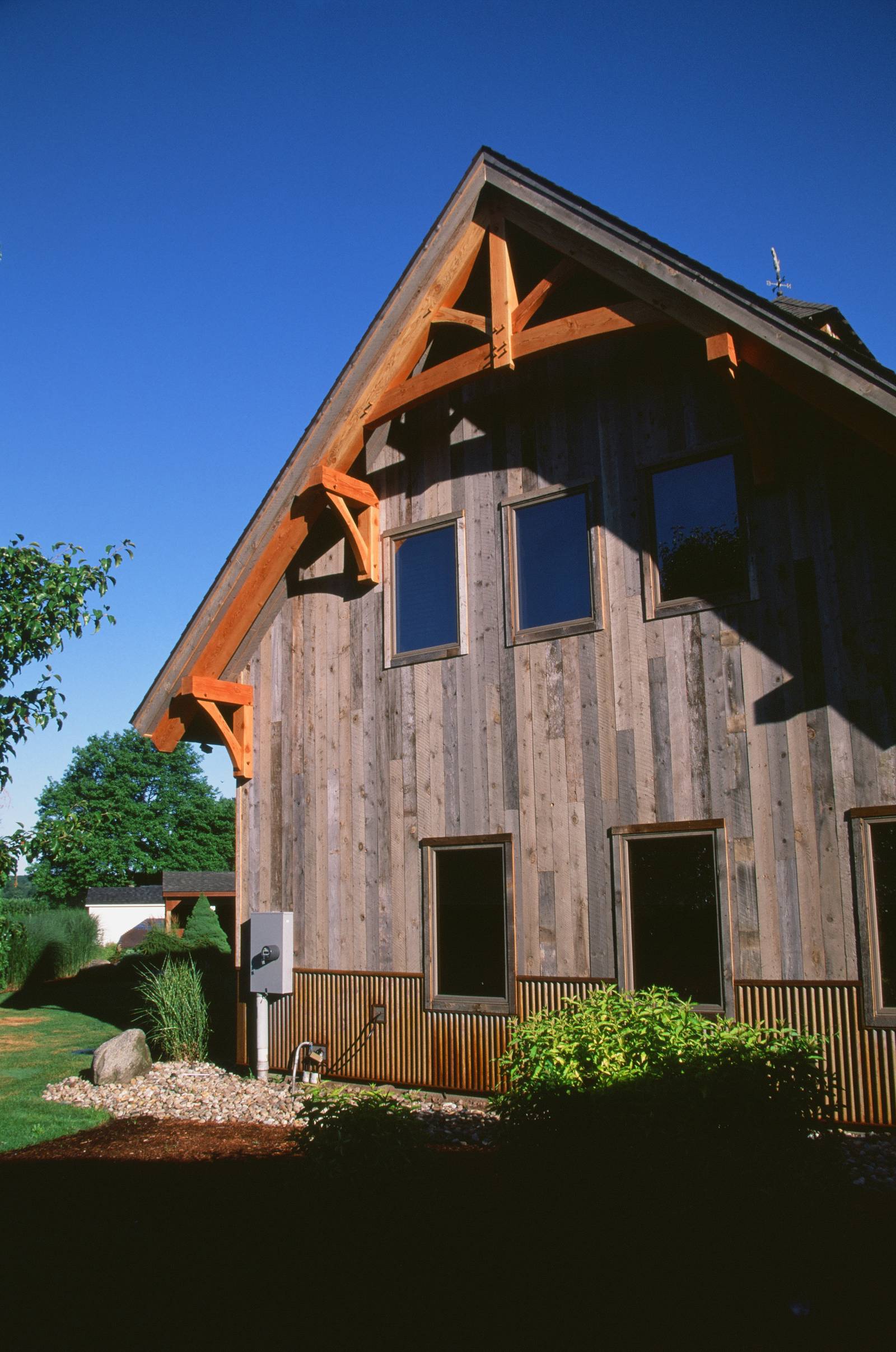 Timber Frame Gable Accents & Reclaimed Barn Board Siding from Trestlewood