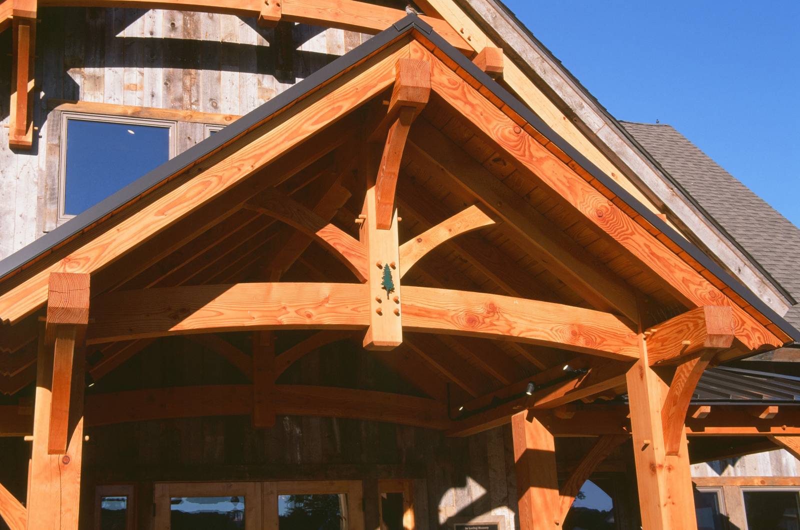 Looking up at the Timbers in the Porch - Notice the Arched Bottom Chord of the King Post Truss