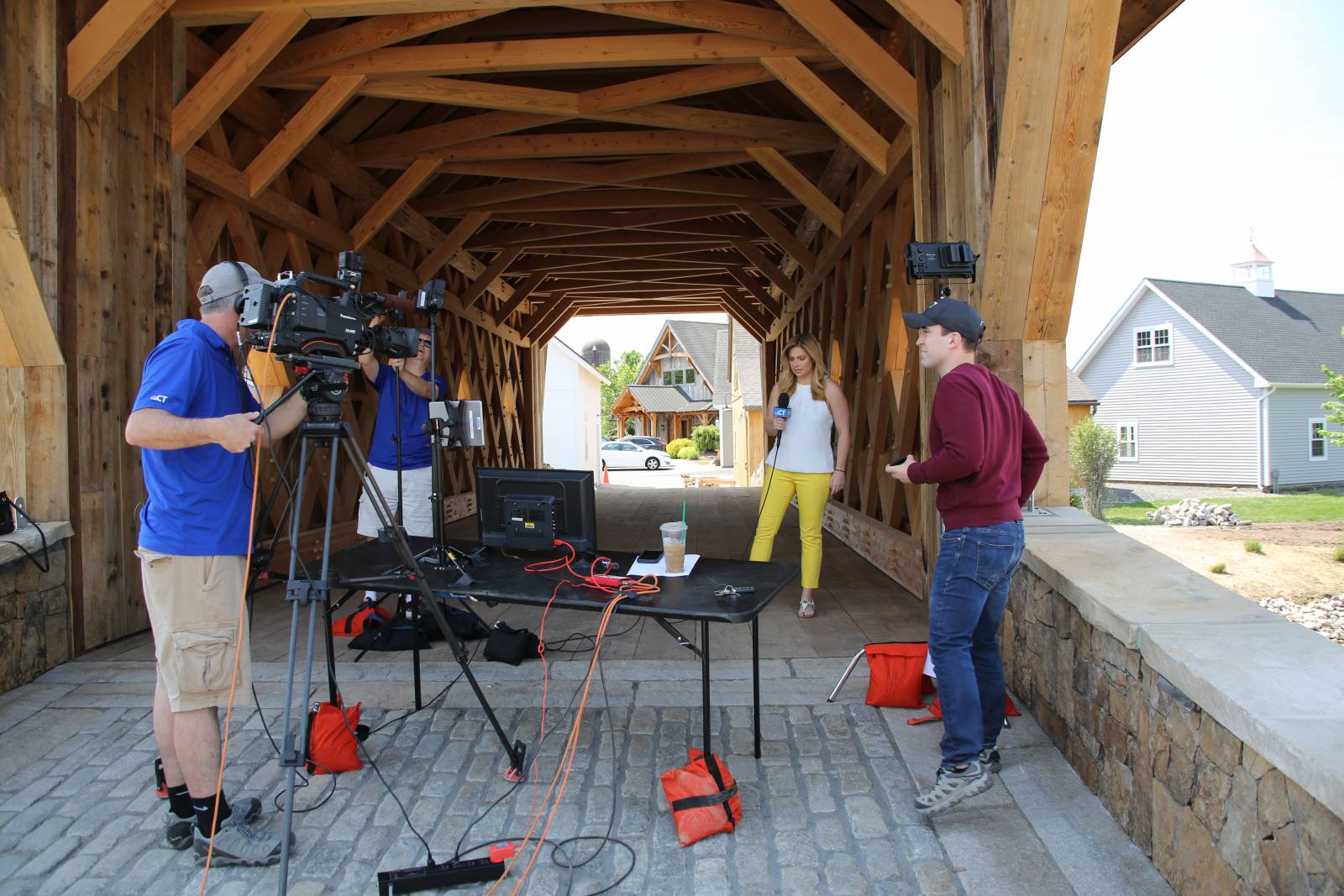 Crew sets up lights & prompter