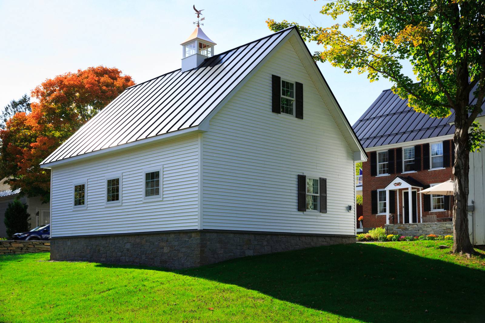 A-Frame Roof • Copper Top Cupola • Two-Car Garage