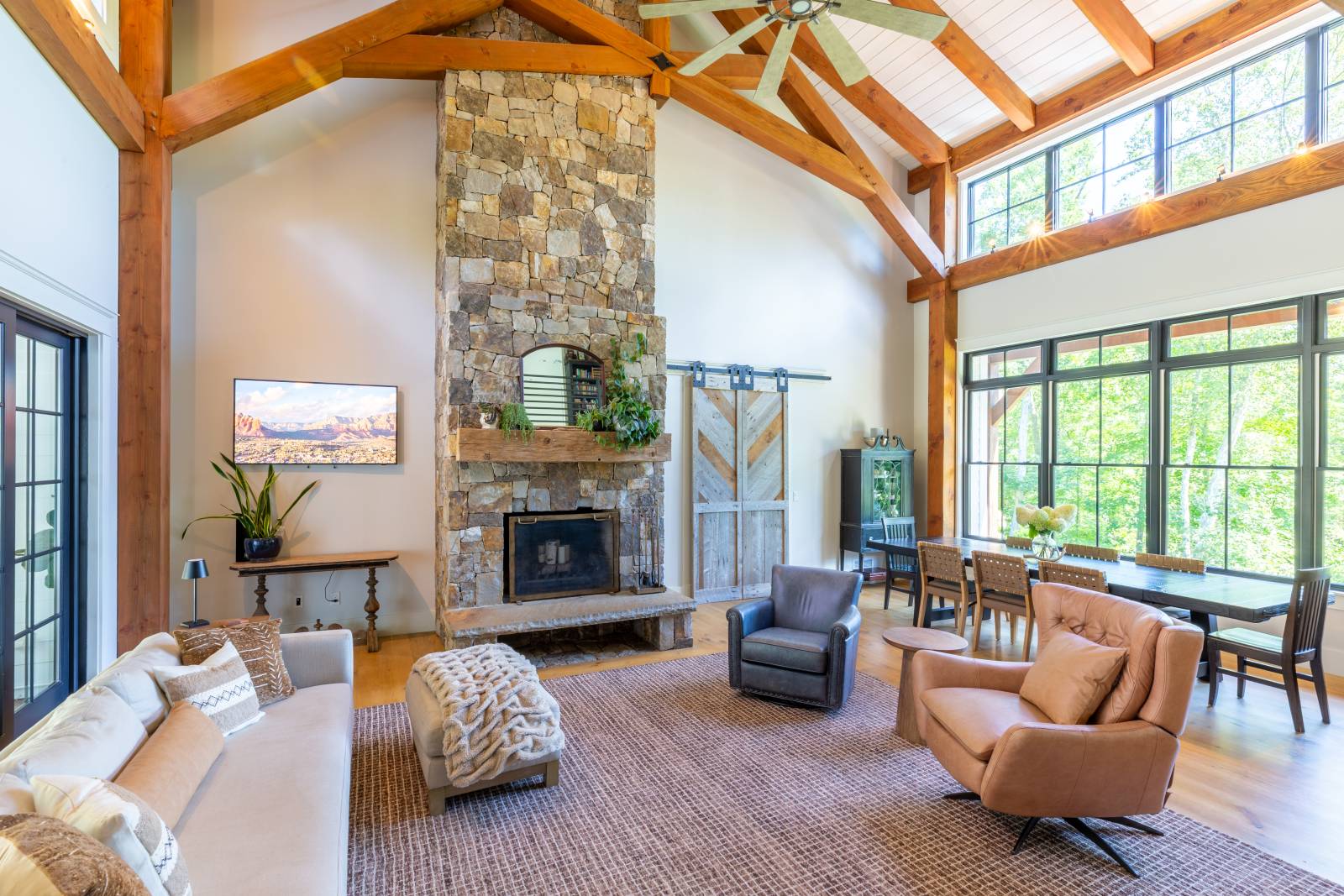 The timber accents stand out amongst the bright walls & light decor of the great room