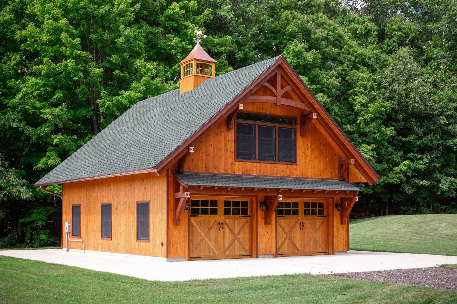 Extended Overhangs and Timber Truss Accent with Show Rafter on 30' x 34' Plymouth Carriage Barn