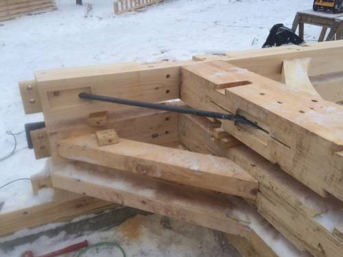 Exposed tension rod above; concealed rod below