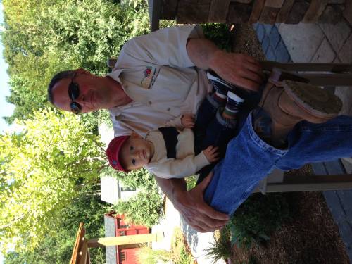 Grandpa Ev relaxing with Harrison
