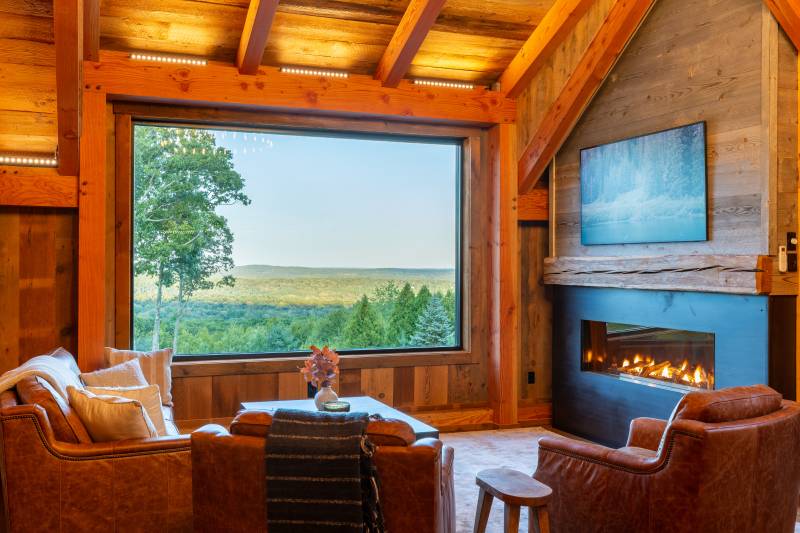 Gas Fireplace • Large Glass Window with Views