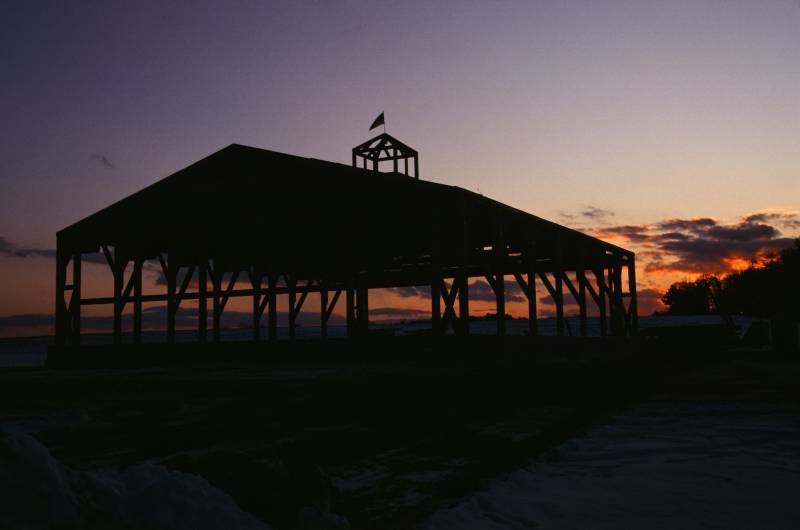 The Hangar, silhouetted at sunset