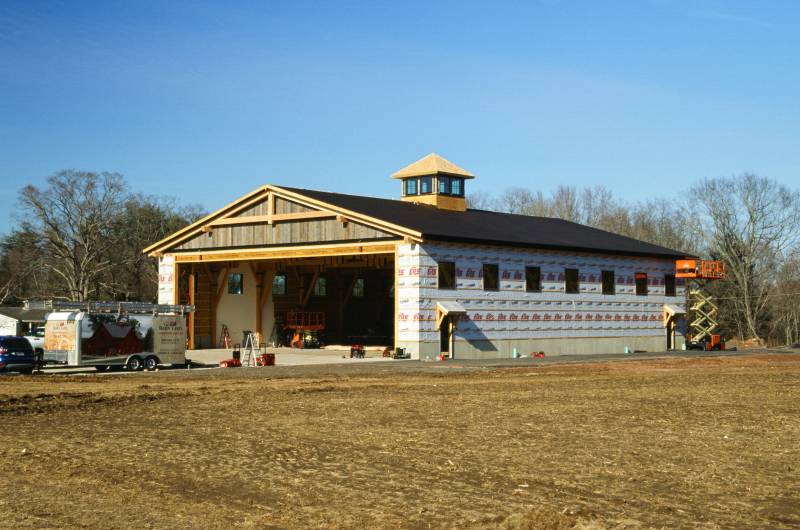 Adding the corrugated metal roofing
