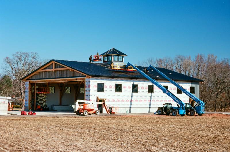 Installing the corrugated roofing and siding