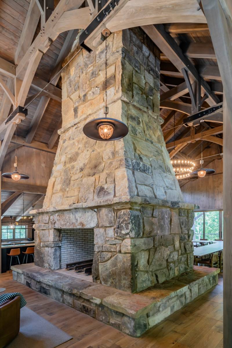 Another angle of the fireplace • Timber frame event barn