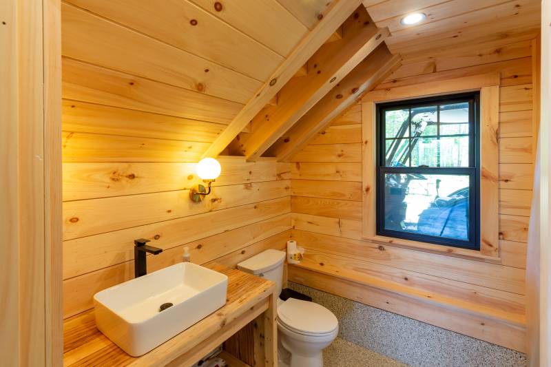Inside the first floor bathroom of the timber frame barn