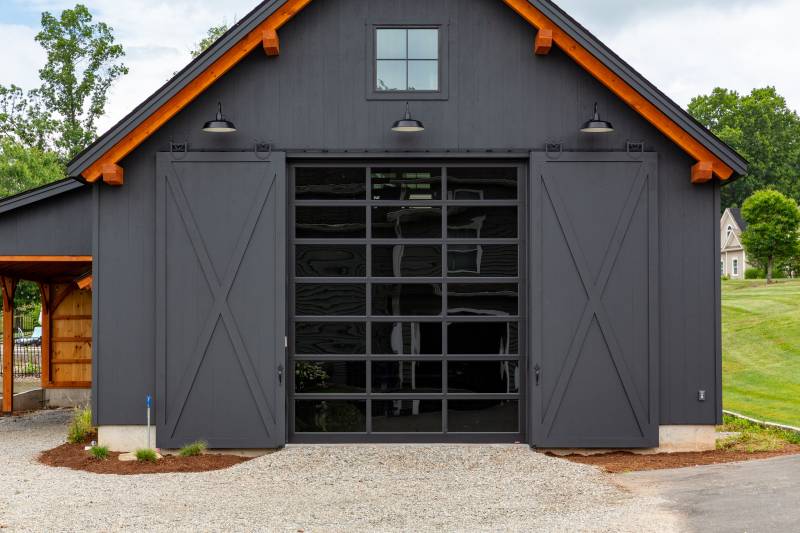 12' x 14' Garaga California Full Glass Overhead Door • 12' x 14'6" Pine Split Sliding Doors