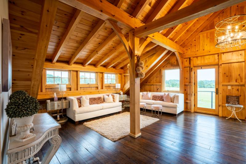 Spacious seating area in the post & beam barn’s bridal suite