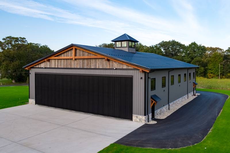 Barn board & timber frame accent • Corrugated metal siding