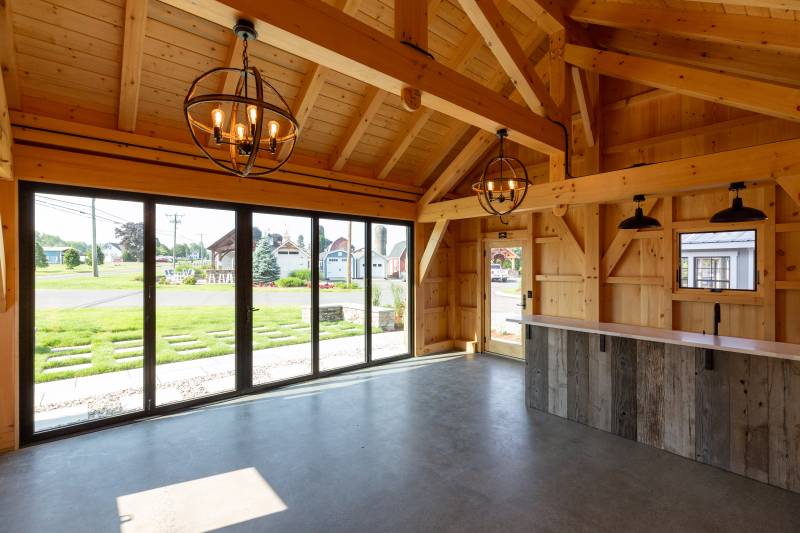 Entertain guests inside the spacious timber frame pool house