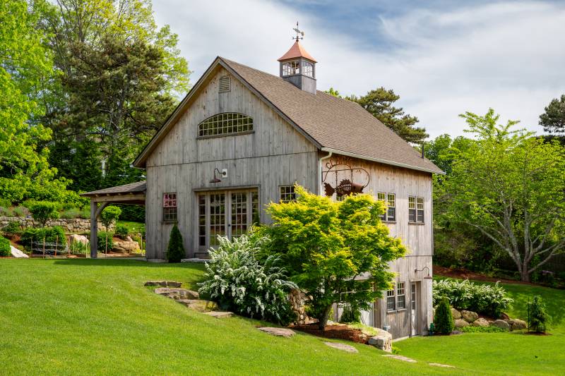 This is a bank barn, characterized by an entryway on each floor