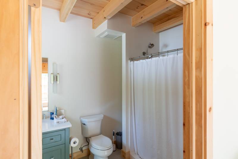 A full bathroom within the barn home